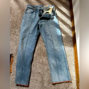 wyatt valdez. mid/high-rise pintuck straight leg, well-washed 13.25oz denim